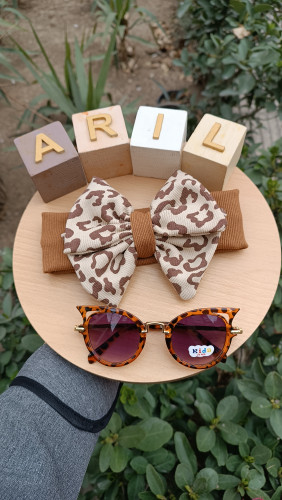 عینک آفتابی و هدبند پلنگی